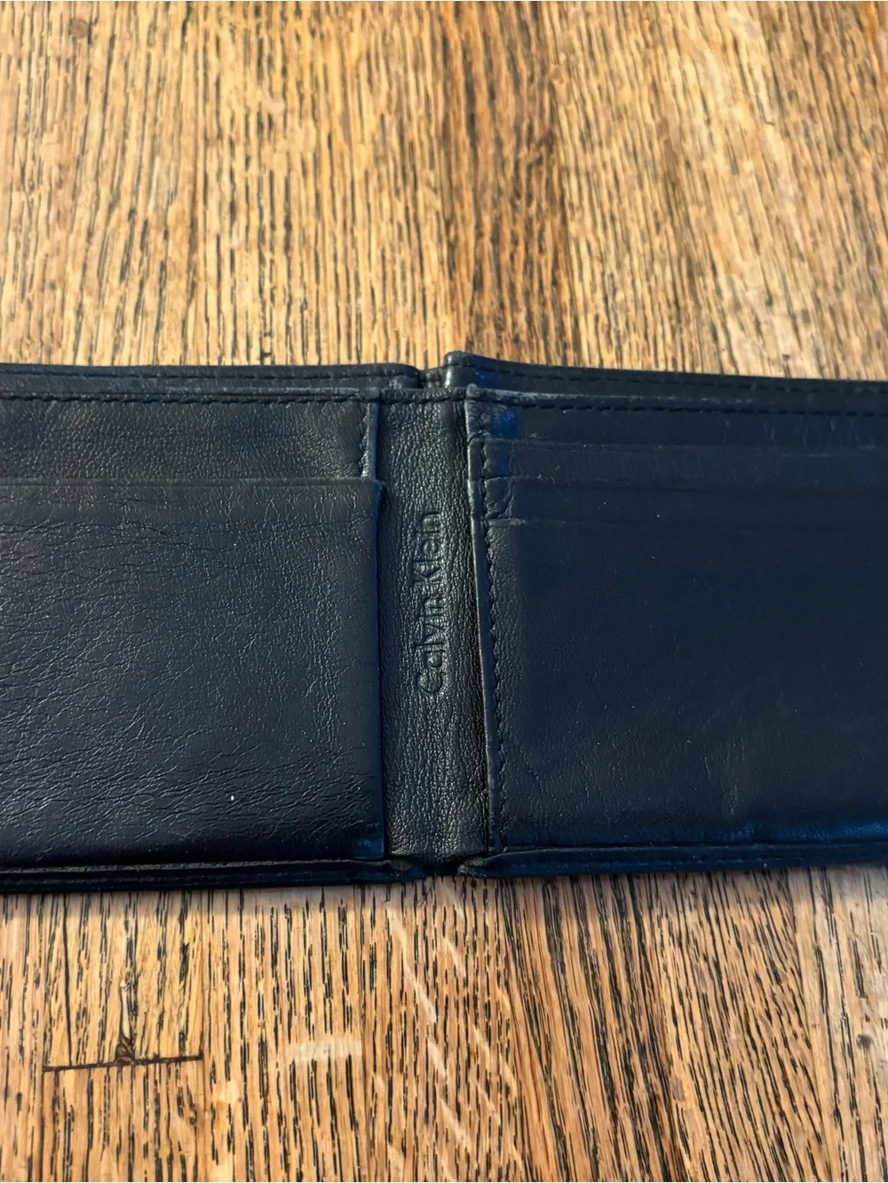 Four Vintage Black and Brown Leather Men's Wallets
